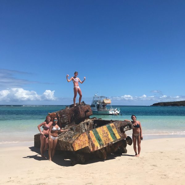 a group of people on a beach