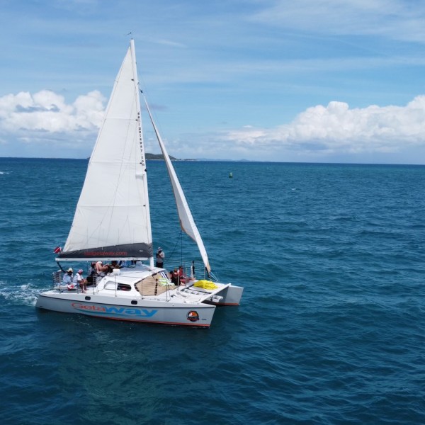 a small boat in a large body of water