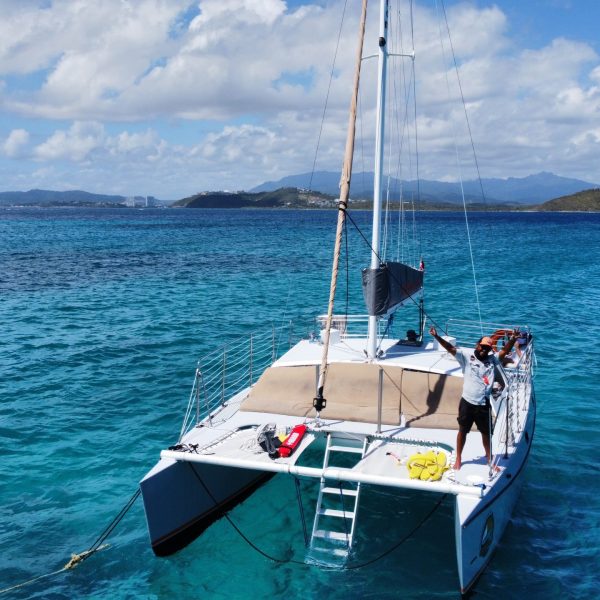 a small boat in a large body of water