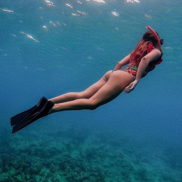 a person swimming in the water