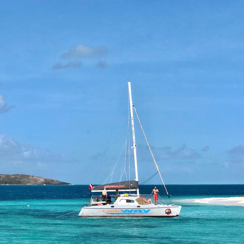 a small boat in a large body of water