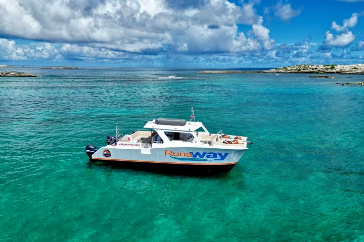 a small boat in a body of water