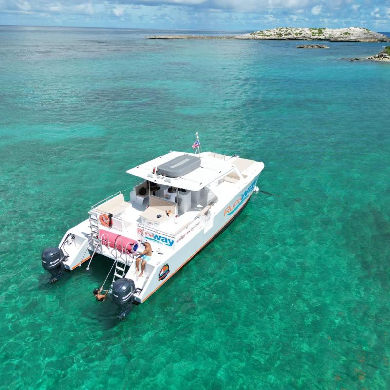 a boat sitting next to a body of water