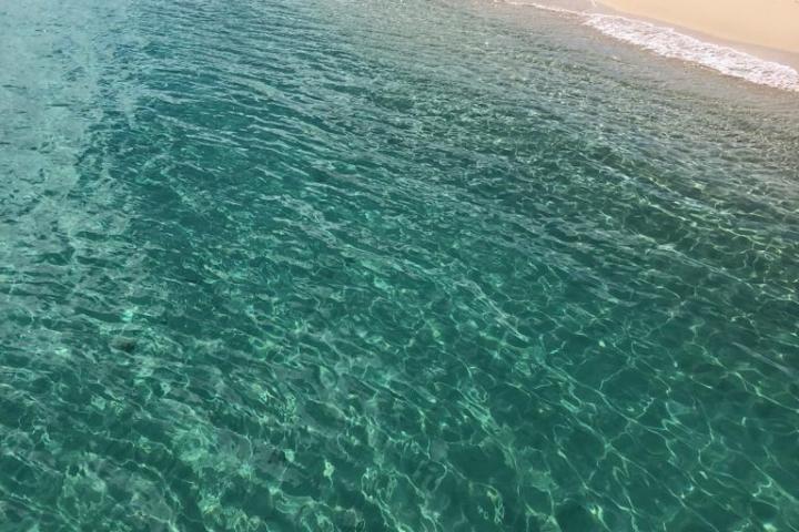a body of water next to the ocean