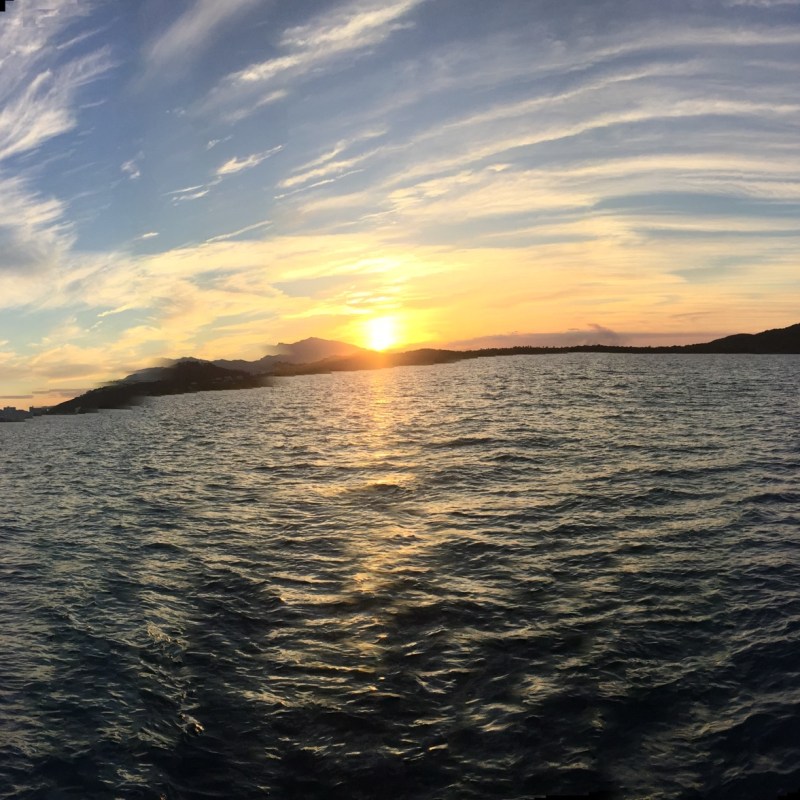 a sunset over a body of water