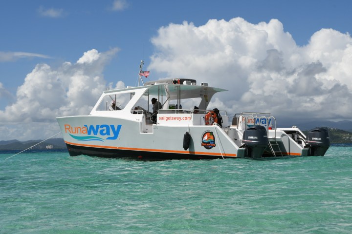 a small boat in a body of water