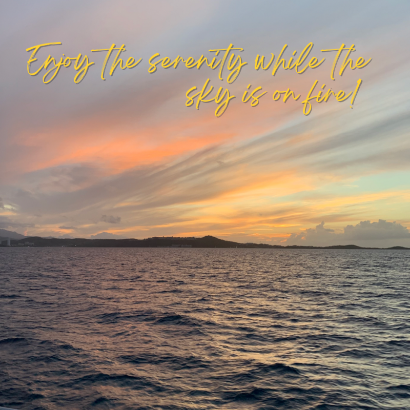 a sunset over a body of water