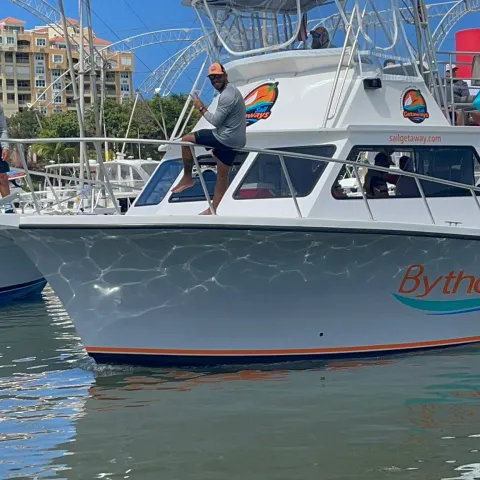 a boat is docked next to a body of water