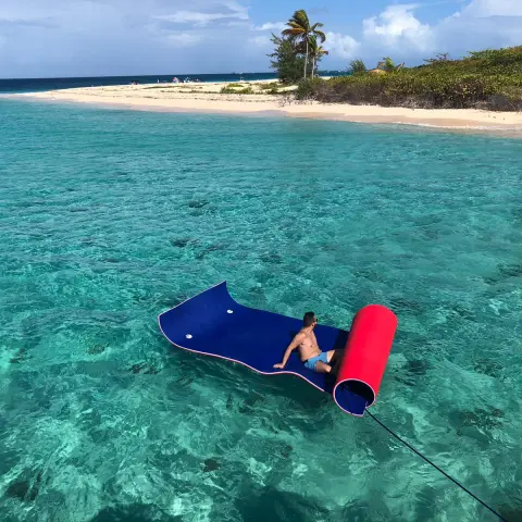 a pool next to a body of water