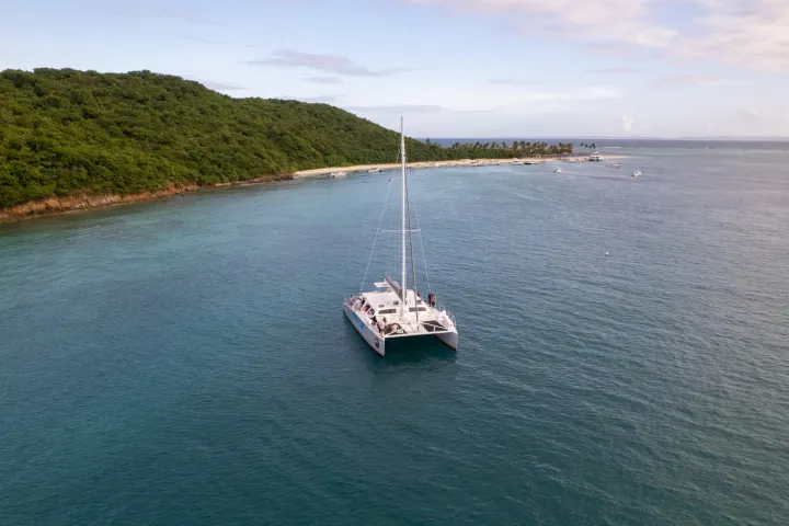 a small boat in a large body of water